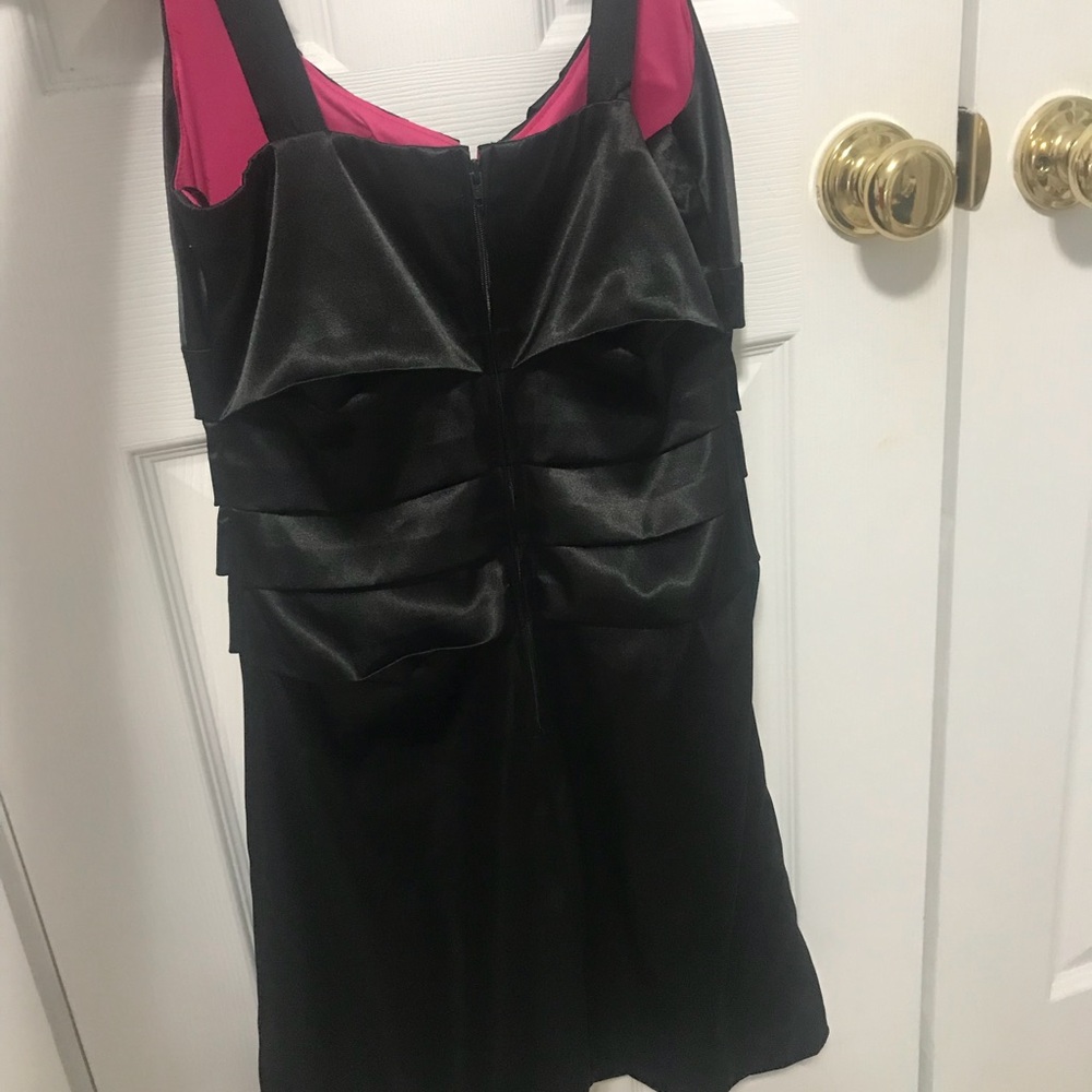 Black sleek silk dress.